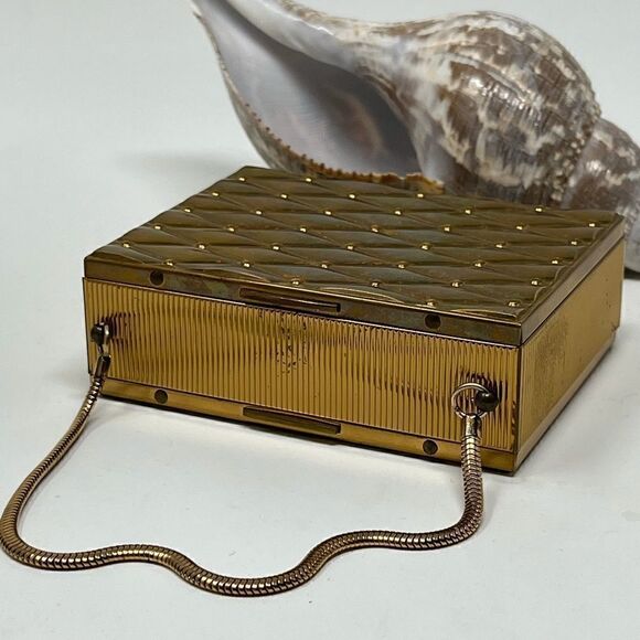 Vintage, gold tone compact/purse.  